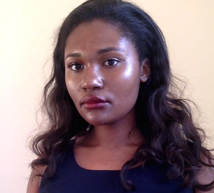 Photo portrait of Alexis D. Reaves, former Historical Accountability Student Research Intern.