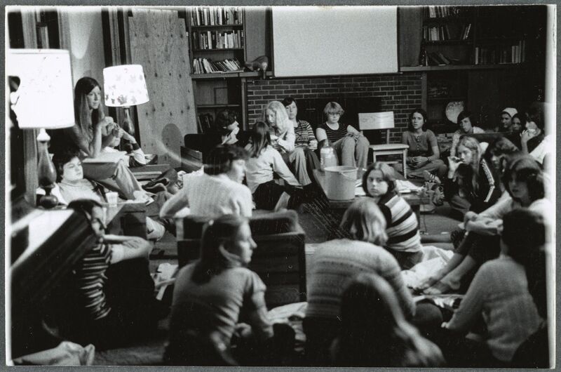 A black-and-white photo of the members of CB meeting in Foley House.